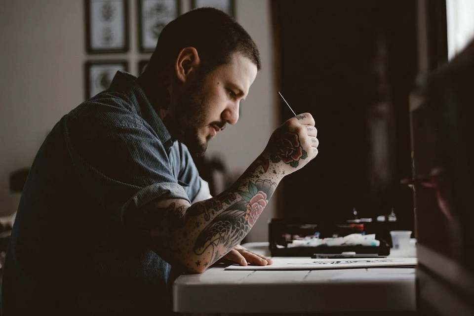 4 Steps to Work as a Tattoo Artist in Canada : Easy guide - Minawari