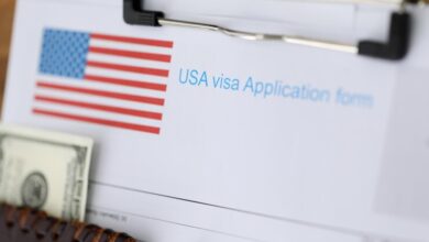 documents american visa passport with money lying table closeup 151013 33657